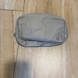 lululemon athletica gray beltbag 1L price tag removed, description tag attached